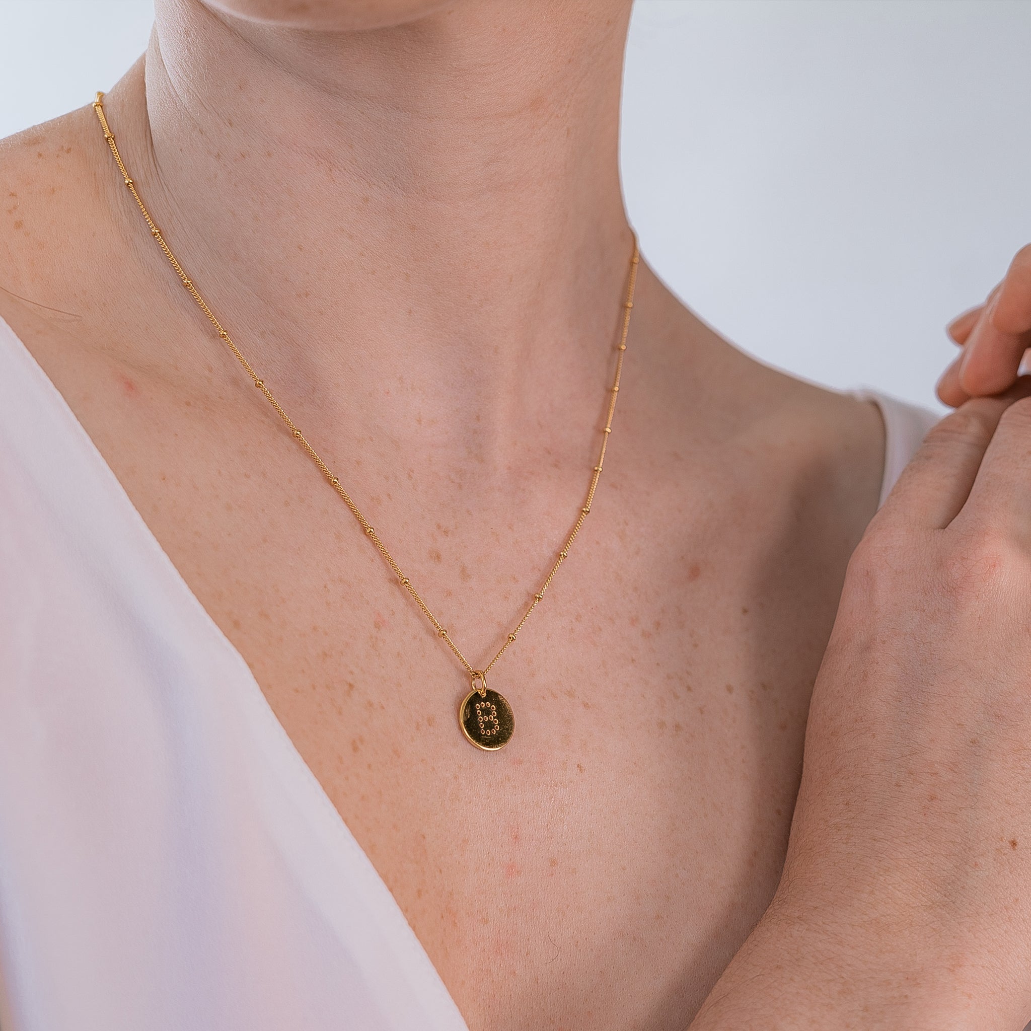 alphabet necklace with letter pendant in 18ct Gold Vermeil on model