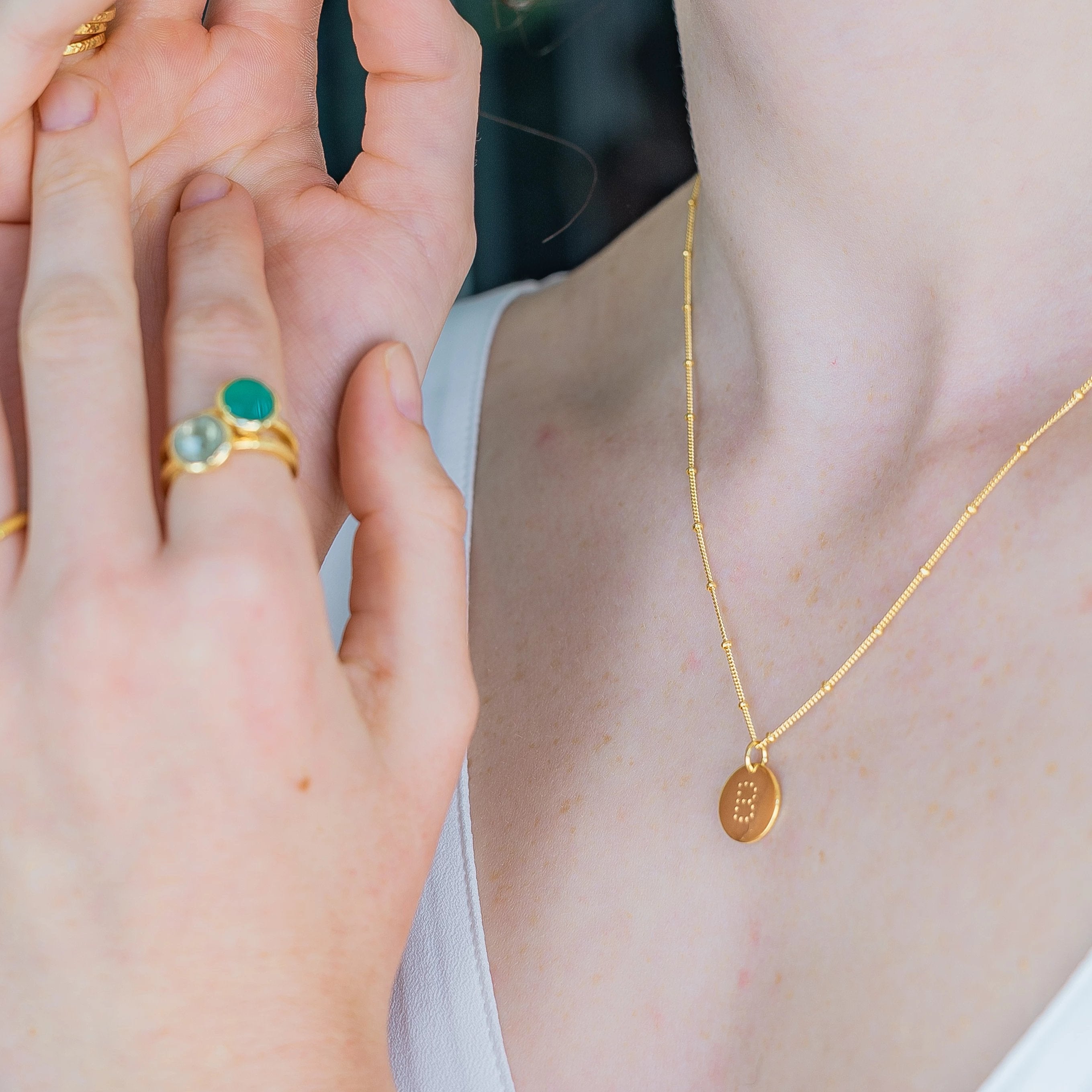 alphabet necklace with letter pendant in 18ct Gold Vermeil on model