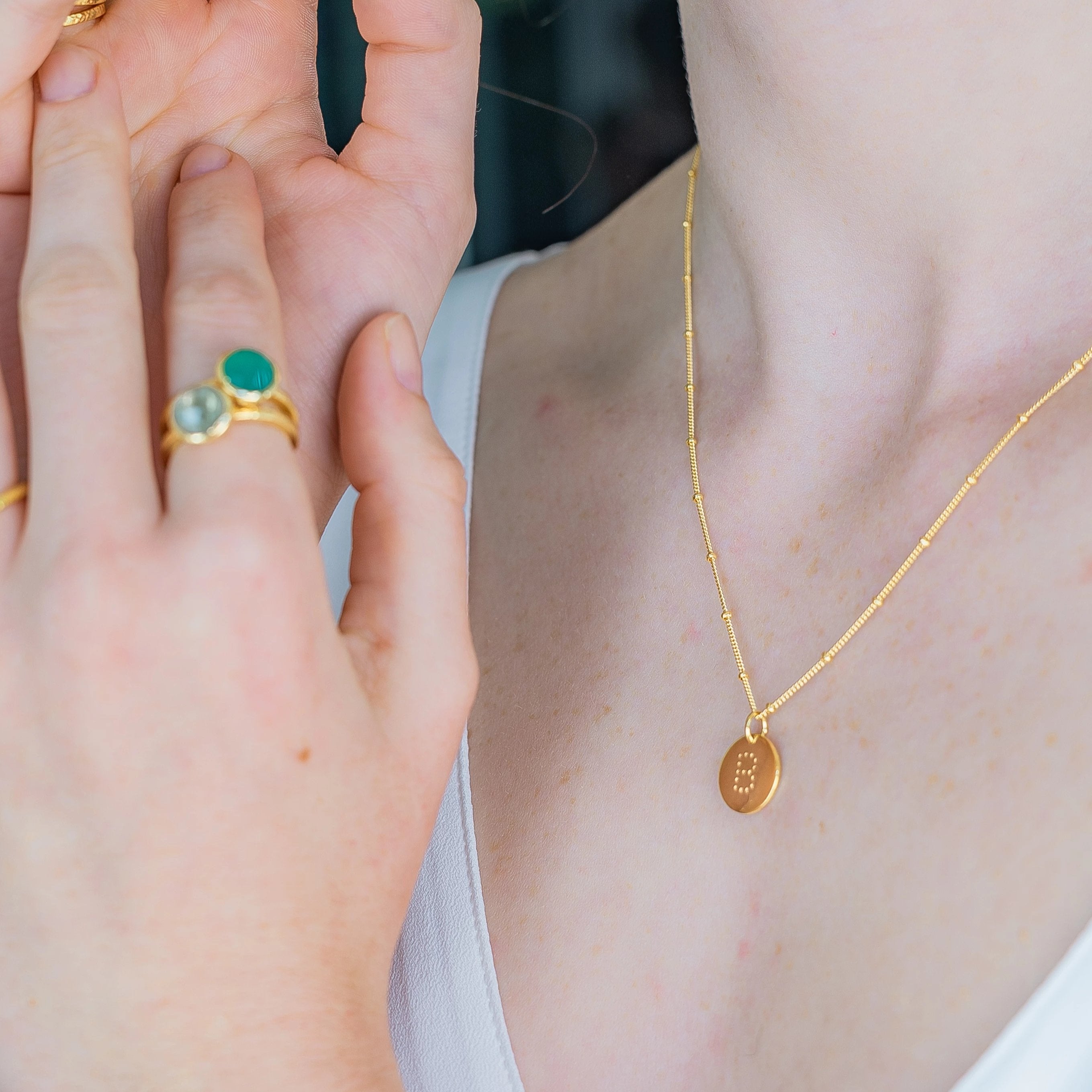 alphabet necklace with letter pendant in 18ct Gold Vermeil on model