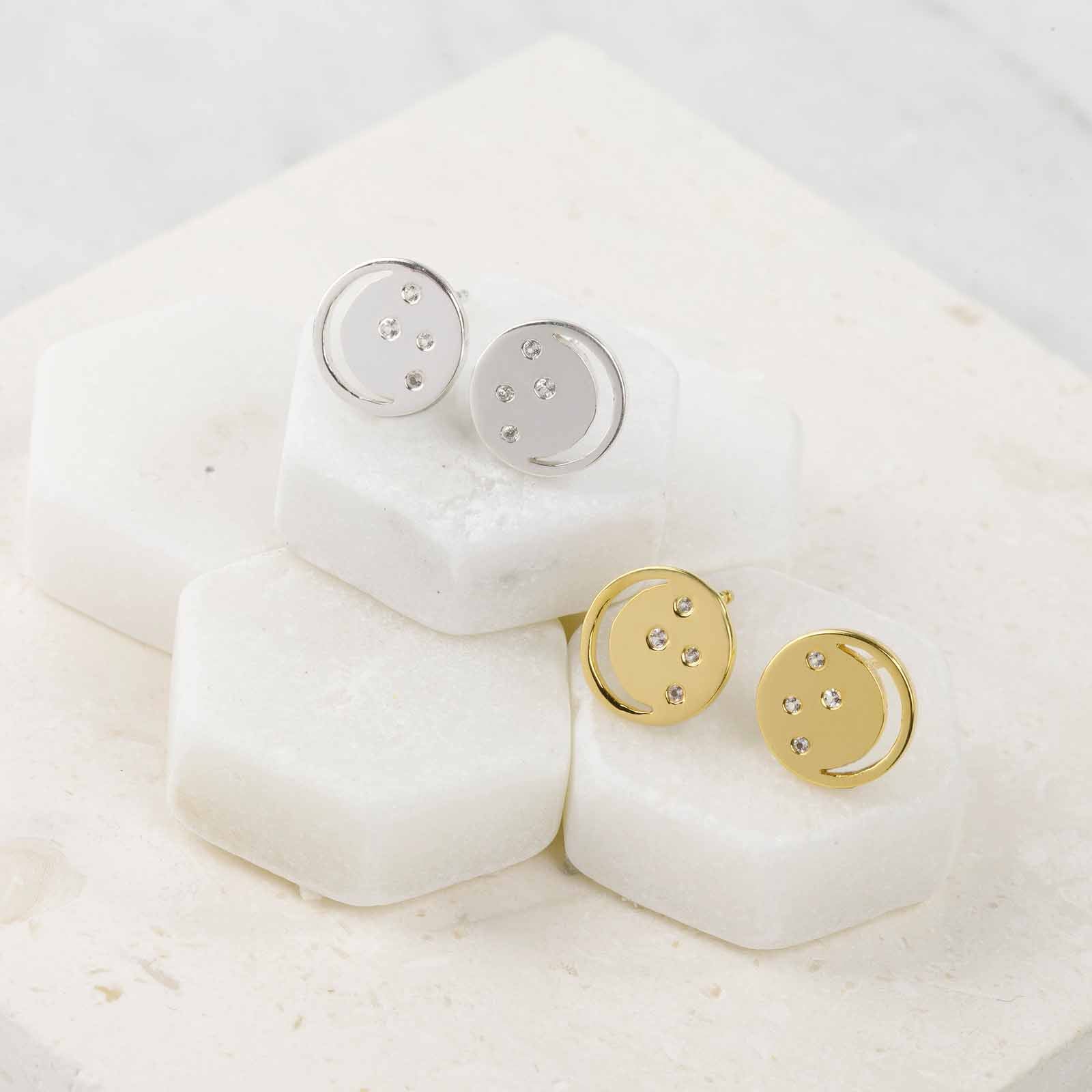 Gold, silver eclipse studs, white topaz, unique British design, minimalist