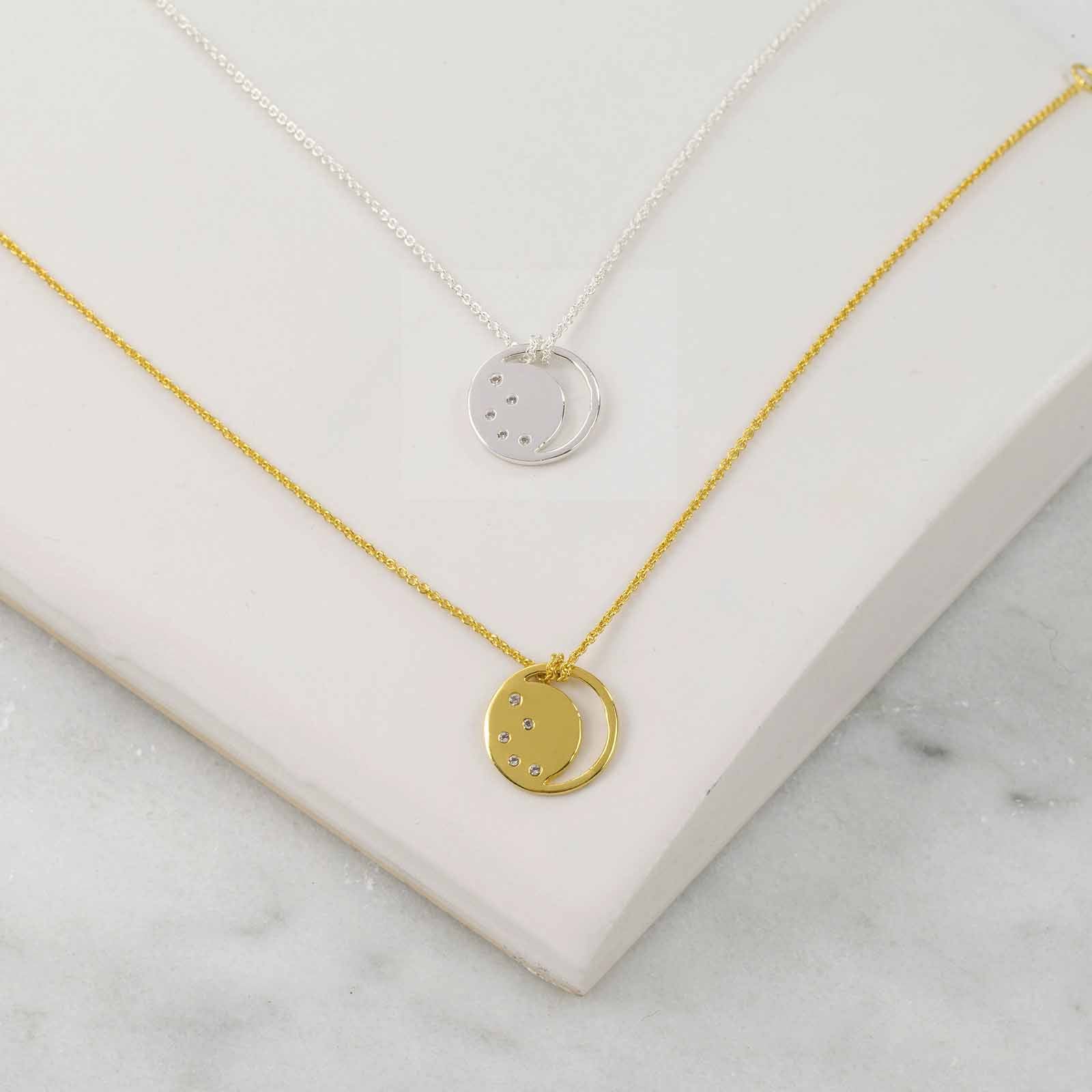 Gold, silver eclipse necklace, white topaz, unique British design