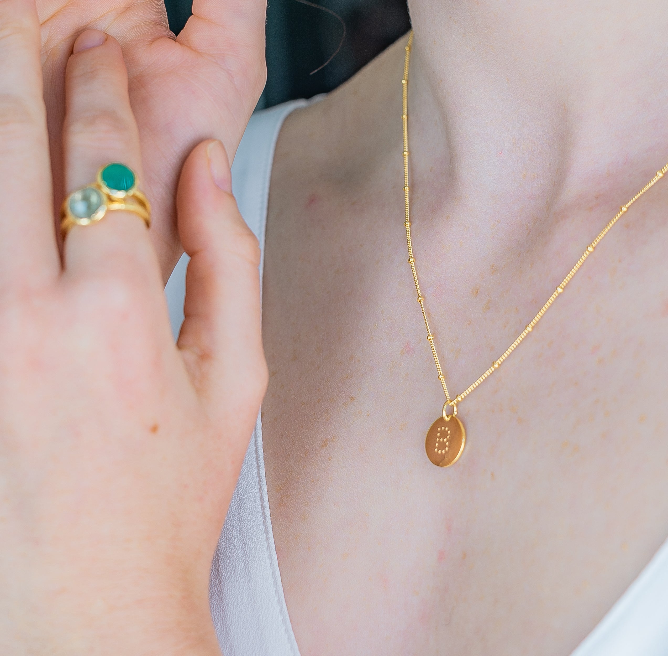 alphabet necklace with letter pendant in 18ct Gold Vermeil on model