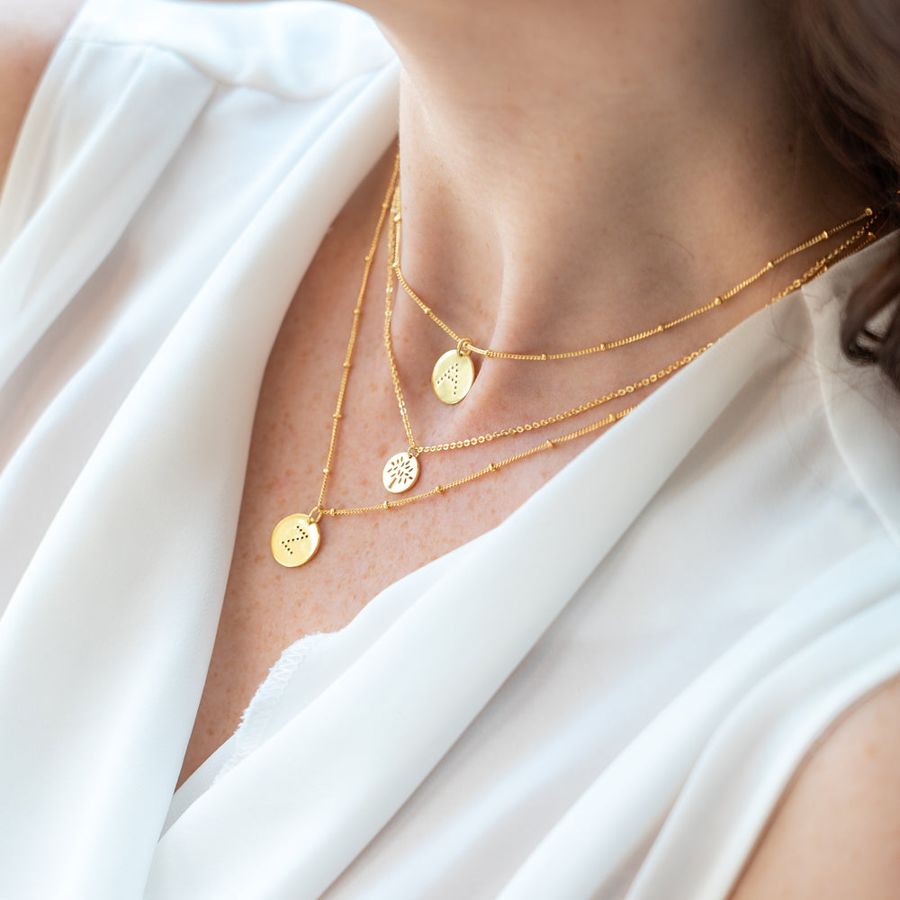 layering alphabet necklaces with letter pendant in 18ct Gold Vermeil on model